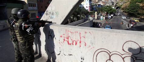 Polícia investiga troca de facção em comunidade .